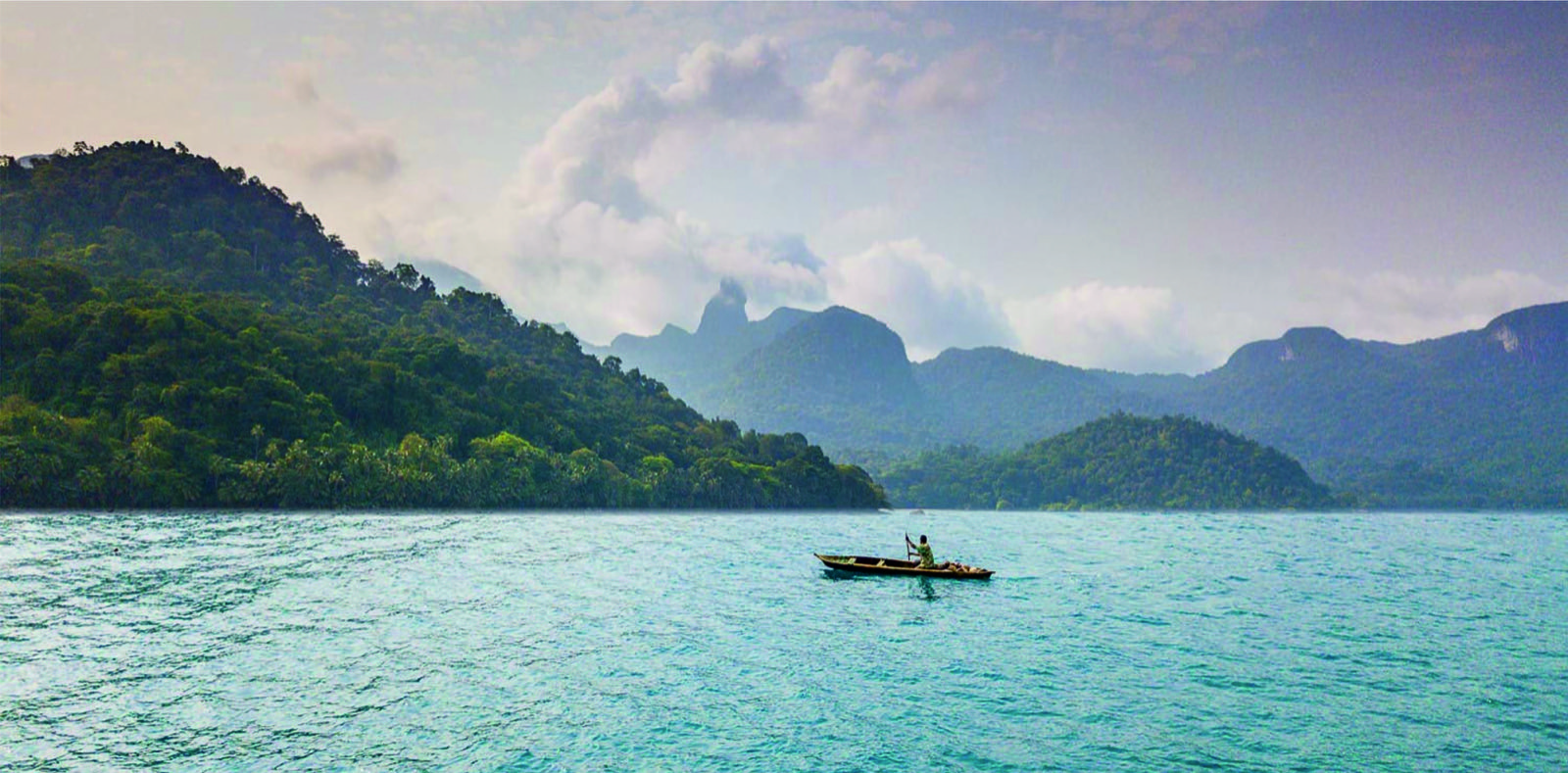 Approaching the south of São Tomé by canoe